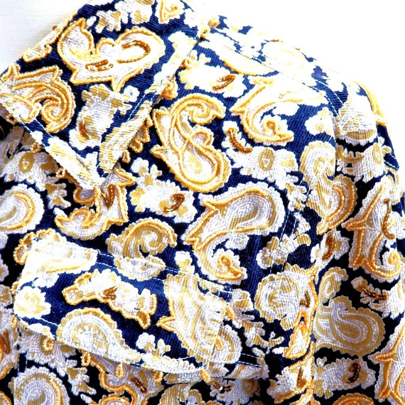 Printed black shirt with gold paisley motif