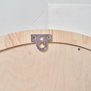 Wall mounting hardware and back hanger detail of wooden magnetic chalkboard