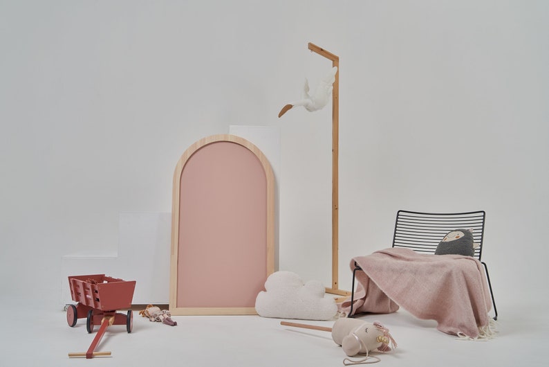 Large pink arch magnetic chalkboard displayed in a modern children's room