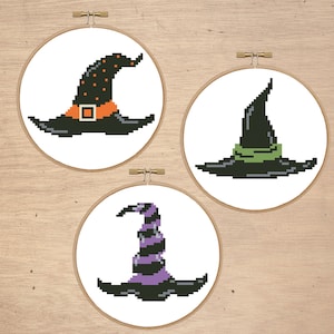 Pode incluir: Três designs diferentes de chapéus de bruxa em fundos brancos. O primeiro chapéu é preto com bolinhas laranja e brancas e uma fivela preta. O segundo chapéu é preto com uma faixa verde. O terceiro chapéu é preto com listras roxas e brancas.