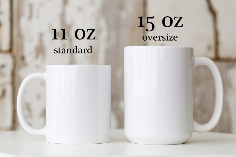 May include: Two white ceramic mugs, one labeled "11 oz standard" and the other "15 oz oversize".