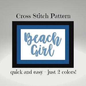 May include: A cross stitch pattern framed in black and blue, with the words "Beach Girl" in light blue script. The text "quick and easy - just 2 colors!" is at the bottom, indicating a simple design.