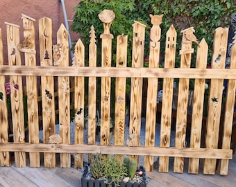 Art fairytale decorative fence made of solid pallet wooden boards, nature flamed, garden, yard, terrace, balcony, owl, cat, dog, hedgehog,,,,