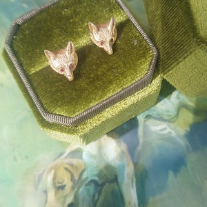 A vintage pair of fox mask earrings. 9ct gold fox head studs. Fully hallmarked with ruby faceted eyes. English foxhunting attire. Gold fox. image 5