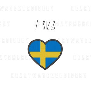 May include: A heart-shaped embroidery design featuring the Swedish flag. The flag is blue with a yellow cross. The design is available in 7 sizes.