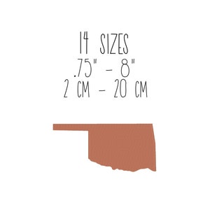 May include: A brown outline of the state of Oklahoma with the text "1/4 SIZES .75" - 8" 2 CM - 20 CM"