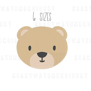 Può includere: Designo di viso di orso ricamato in sei dimensioni. L'orso ha un viso marrone con occhi, naso e bocca neri.