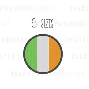 May include: A circular embroidered patch featuring the Irish flag. The flag is green, white, and orange. The patch is surrounded by a black outline.