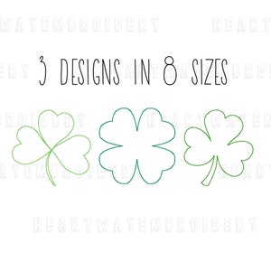 Può includere: Tre diversi design di contorni di trifoglio in verde. Il testo "3 DESIGNS IN 8 SIZES" è sopra i trifogli.