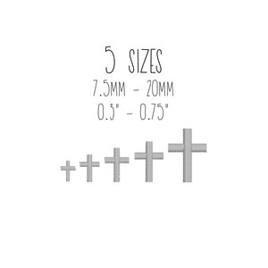 May include: Five sizes of silver crosses, ranging from 0.3 to 0.75 inches in size.