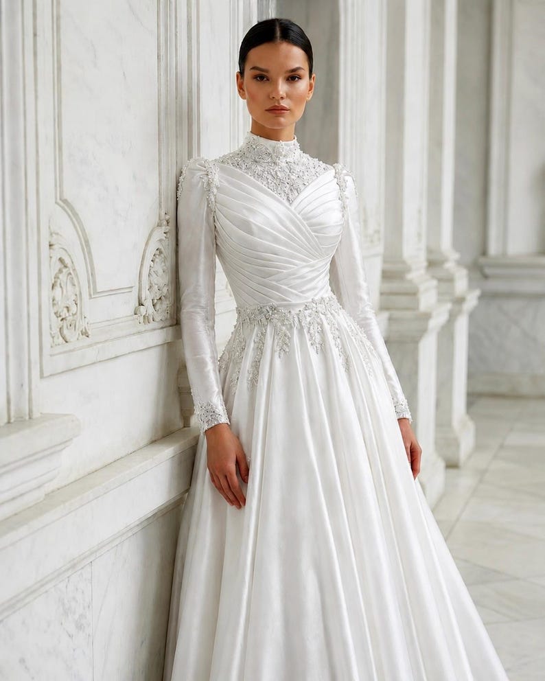 Structured bodice satin gown with elegant shaping and refined bridal craftsmanship