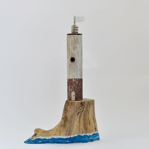 Driftwood sculpture brown lighthouse with inox steel top on an wooden root for home decoration or gift for friend