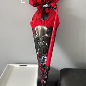 SAC D'ÉCOLE avec une épée Star Wars cool