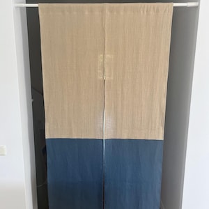 May include: A set of three ceramic mugs with a speckled, matte finish. The mugs are in shades of cream, light gray, and dark gray. Each mug has a simple, minimalist design and a rounded handle.