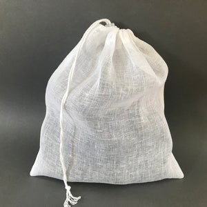Sac à linge en filet de lin pour chaussettes, soutien-gorge ou linge délicat. Trousse de toilette légère avec cordon de serrage. Sacs à linge en filet lavables pour protéger vos vêtements.