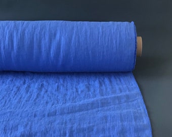 Cornflower blue linen fabric by the metre. Softened linen fabric by the yard. Medium weight linen for sewing clothing or home textile.
