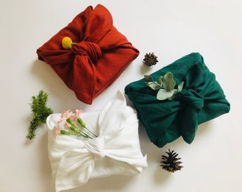 Furoshiki wrapping cloth for Christmas in dark red, dark green or white colours. Linen gift wrapping cloth. Sustainable fabric gift wrap.