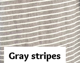 Tissu en lin rayé extra large par yard ou mètre avec des rayures horizontales grises et blanc crème. 235 cm / 92,5" de large. Poids moyen/lourd.
