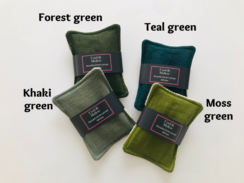 May include: Four reusable kitchen sponges in different shades of green: forest green, teal green, khaki green, and moss green. Each sponge has a black label with the text "Cool & Mellow Reusable Kitchen Sponge 100% linen".