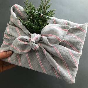 Linen furoshiki cloth. Grey furoshiki wrapping cloth with pink stripes. Reusable gift wrapping cloth. Zero waste holiday gift wrap ideas.