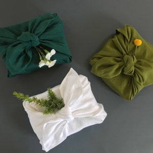 Eco-friendly reusable gift wrap. Linen furoshiki wrapping cloth. Furoshiki in small, medium or large. Gifts wrapping ideas for Christmas.