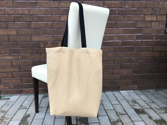 Tan Linen Tote Bag With Black Handles and Zipper Pocket. Beige 