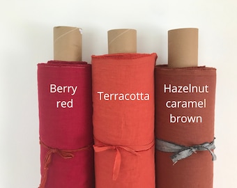 Linen fabric by the yard cut-to-length in terracotta, hazelnut brown, red. Softened, pre-washed, medium weight for clothing. Sustainable