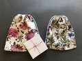Reusable linen gift bags for women. 100% linen drawstring bag. Holiday gift wrap ideas. Sustainable fabric gift wrap. Zero waste gifts.