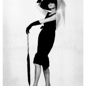 black audrey hepburn dress style elegant A-line The stunning and gorgeous jacquard dress is an exquisite representation of feminine elegance and quality The Skirt is a somewhat irregular design 12 Audrey Hepburn Fashion Moments