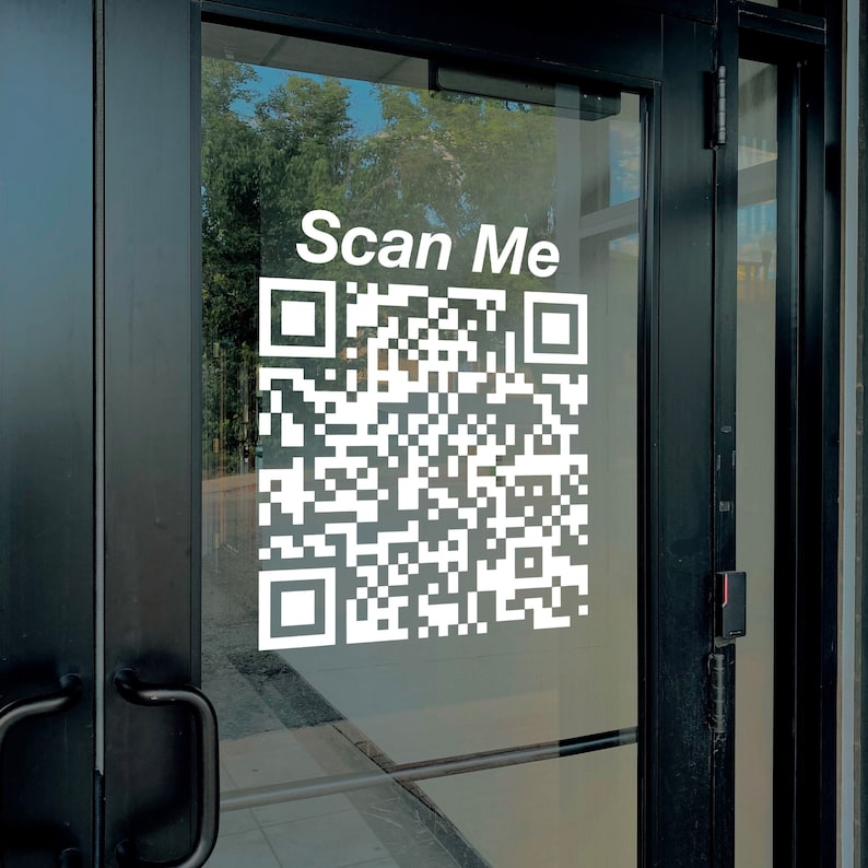 Custom QR code decal applied to business door. Personalized website vinyl sticker.