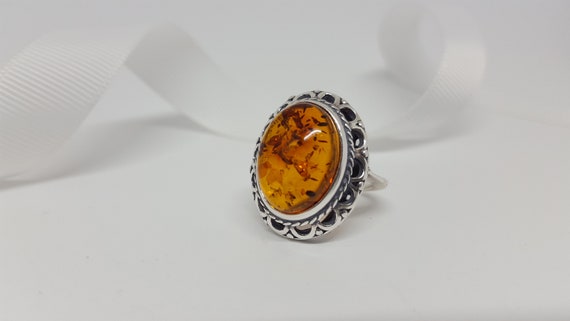 Large Oval Amber Honey Ring in an Oxidized Sterling Silver Setting Large Oval Amber Honey Ring in an Oxidized Sterling Silver Setting