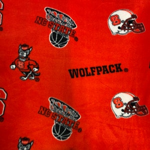 North Carolina State Wolfpack NCAA NCSU allover 58 inches wide FLEECE anti-pill fabric ncsu-035