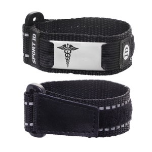 May include: Black medical ID bracelet with a silver plate featuring a caduceus symbol and the text "SPORT ID". The bracelet has a hook and loop closure.