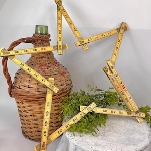 May include: A rustic wooden sign with the text "Welcome to our home" in white lettering. The sign features a distressed finish and a simple, inviting design, perfect for a front porch or entryway.