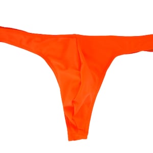 Traje de baño tipo tanga súper ajustado para hombre en color naranja neón