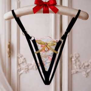 Perizoma floreale trasparente in micro pizzo estremo, lingerie di lusso