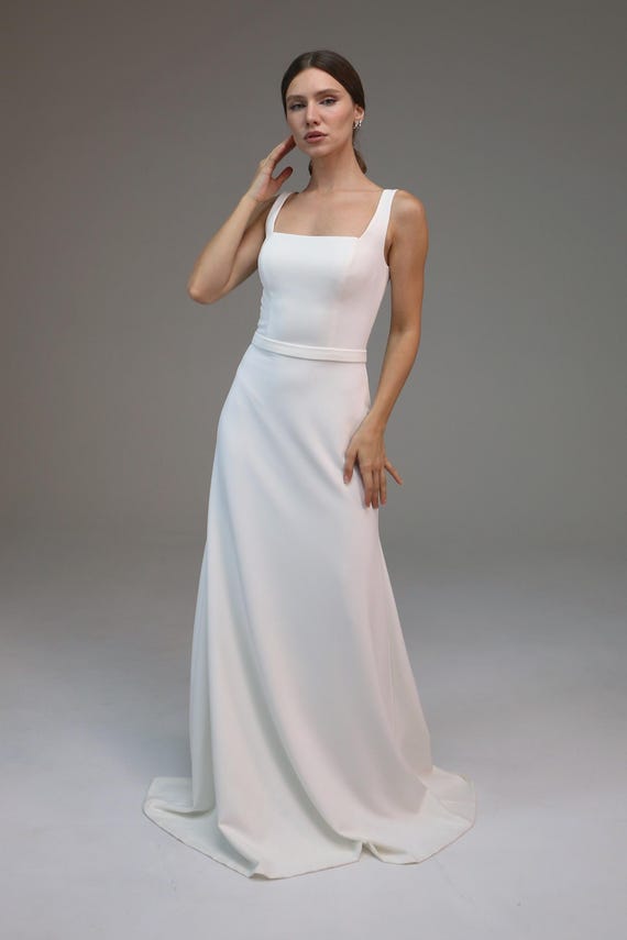 african elegant dresses for women Rosalind Boat Neck Open Back Dress – Minimalist Elegance main image 1