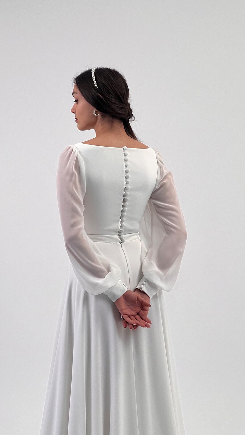 Robe de mariée Kruzita trapèze mousseline col carré manches longues