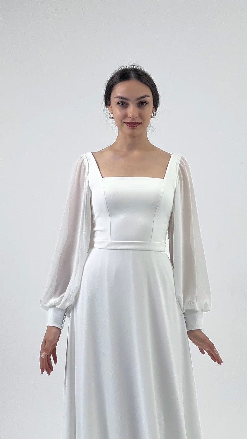 Robe de mariée Kruzita trapèze mousseline col carré manches longues