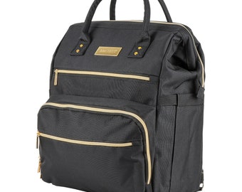 Peut inclure: Sac à dos de sac à langer noir avec des accents dorés et le mot "BABY NUT" sur le devant.