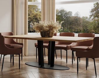 May include: A wooden dining table with a black metal base and six brown leather chairs. The table is set with a vase of dried flowers.
