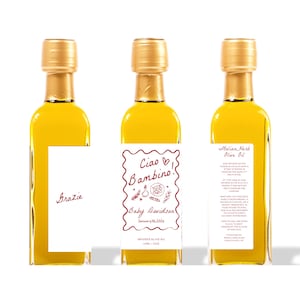 May include: Three small olive oil bottles with gold caps and white labels. One label says "Grazie" in red script. The center bottle has "Ciao Bambino!" and "Baby Davidson" in red. The third bottle says "Italian Herb Olive Oil".