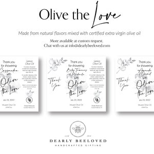 May include: Three white labels with black text and floral designs. The labels say "Thank you for showering [name] with Olive the Love" and "July 23, 2022, Infused Olive Oil 4oz/118ml".