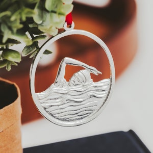 Handcrafted Pewter Swimmer Ornament: North Carolina Design