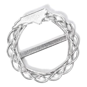 May include: Silver-toned metal belt buckle featuring a raised outline of the state of North Carolina. The buckle is circular with a woven design and a straight bar across the center.