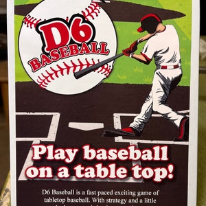 May include: A board game called "D6 Baseball" with a white baseball and red stitching on the cover. The game features a red and black baseball bat and a baseball player in a white uniform. The text on the cover reads "Play baseball on a table top!" and "D6 Baseball is a fast paced exciting game of tabletop baseball. With strategy and a little luck you can bring home a winner."