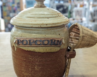1988 handmade pottery Popcorn kernel holder with side loop to hold rattan scooper