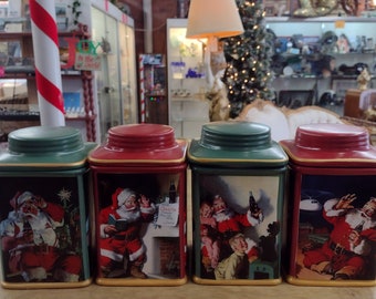 4pc set 2002 Coca-Cola green and red Santa Christmas cannister set