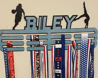 Personalized wall hanging metal holder with Sport Icons perfect for kids rooms to display their achievements.