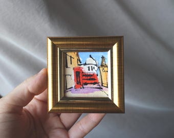 Pintura al óleo de un autobús londinense, enmarcada en 2x2, con el Big Ben y paisaje urbano. Arte pequeño.